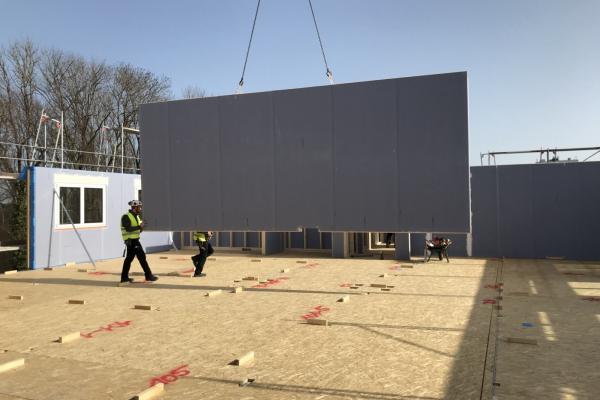 Installation of a prefabricated exterior wall